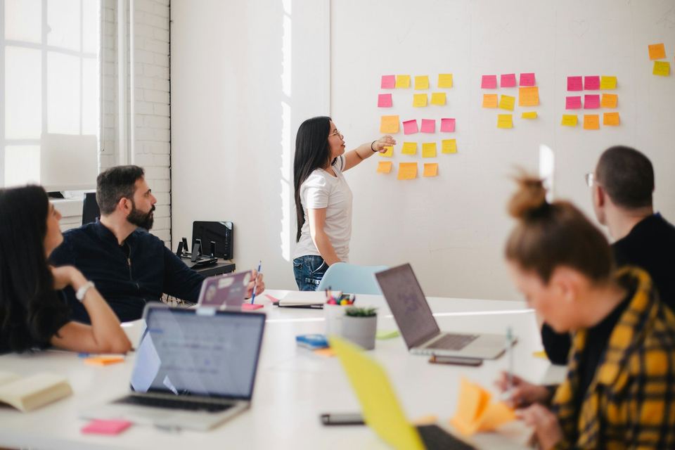 Team planning a business workflow together in a workshop